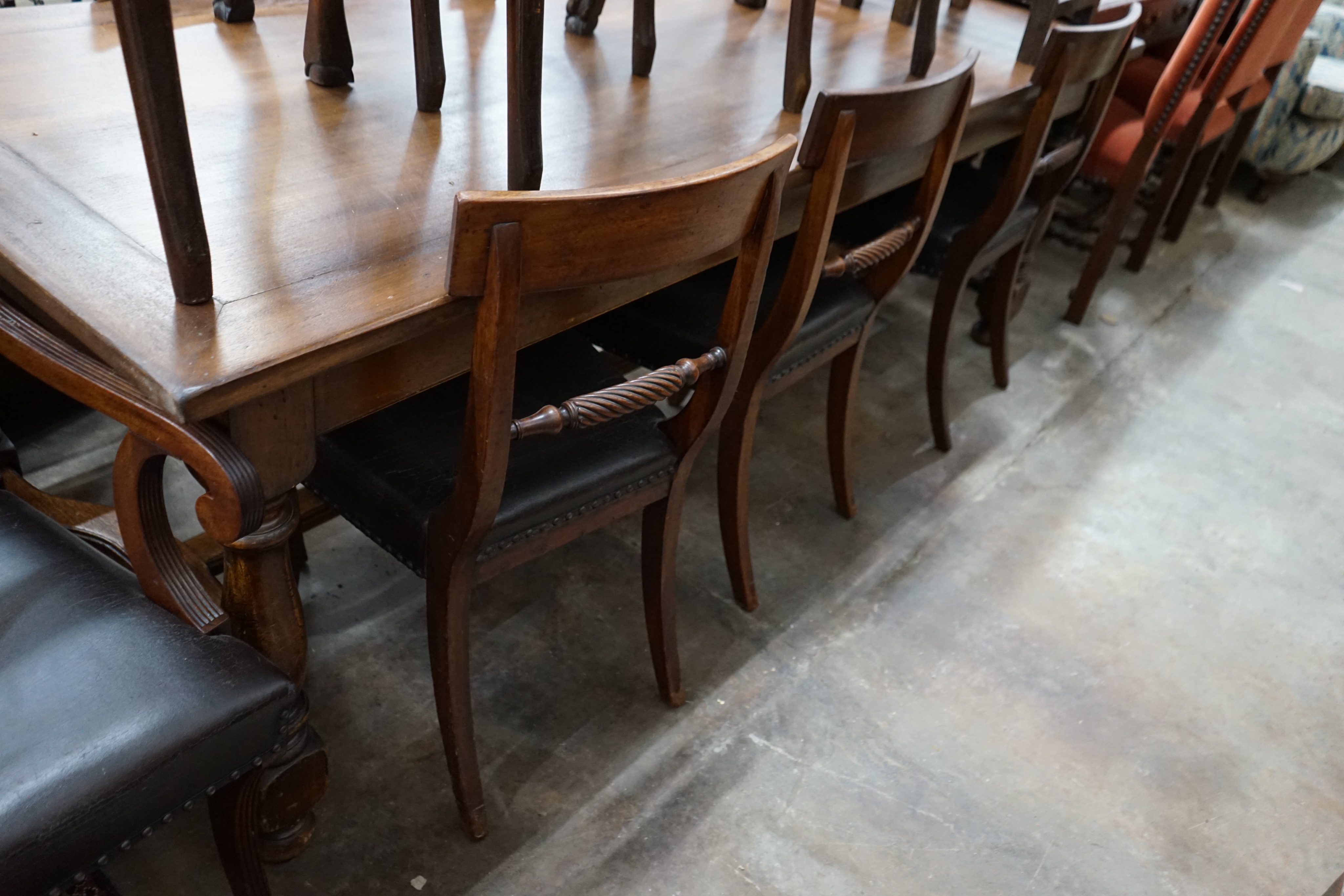 A set of eight Regency mahogany dining chairs, two with arms